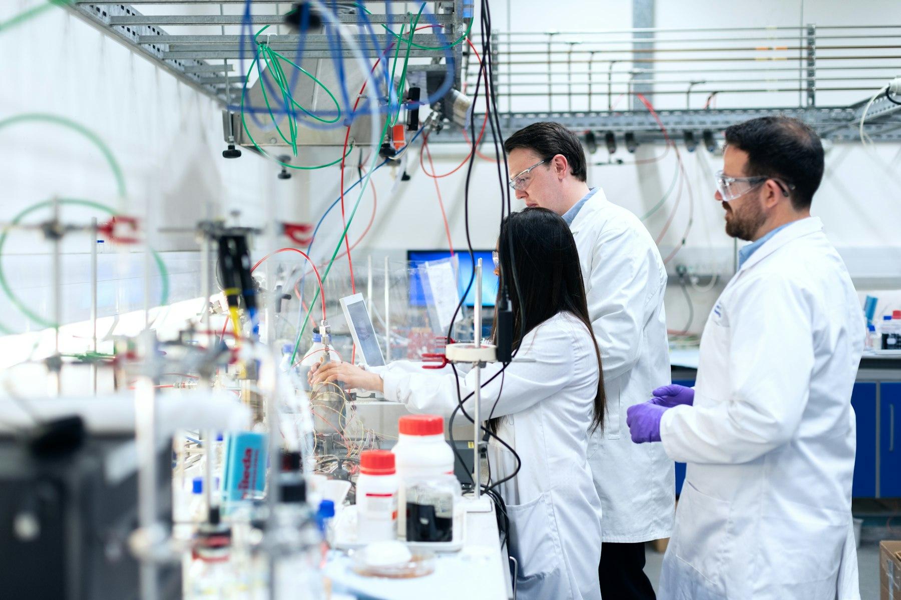 Senior compliance team conducting healthcare regulatory audits across Clinical Laboratories & Physician Offices